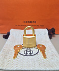 Cadenas Hermès neuf doré mat / Hermès matte golden lock for Kelly & Birkin bag