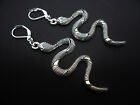 A PAIR OF LONG DANGLY TIBETAN SILVER SNAKE THEMED LEVERBACK HOOK EARRINGS. NEW.