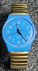 🔴 Swatch Gent azzurro blu metallo dorato