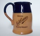 Very rare stoneware Doulton whisky gin advertising jug