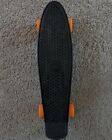 Two Bare Feet Black Penny Skate Board