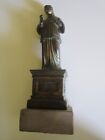 statua antica in bronzo e base in marmo