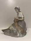 NAO By Lladro lady and dog, large figurine, "minor Chip"