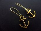 A PAIR OF ANCHOR EARRINGS ON GOLD COLOUR KIDNEY EAR WIRES. NEW.