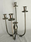 Candelabro , peltro 95% , h max. 34 cm.