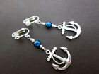 A PAIR OF  TIBETAN SILVER DANGLY SHIPS ANCHOR  BLUE BEAD  CLIP ON EARRINGS. NEW.