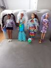 4 Barbie Extra Dolls