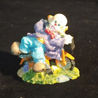 Clown Riding a Bicycle Figurine