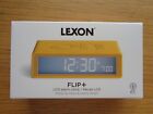 YELLOW LCD FLIP +LEXON ALARM CLOCK. NEW