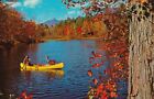 Canoeing on an Autumn Day - Canoe on Lake