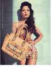 PUBLICITE 2012  GUESS haute couture sacs bagages